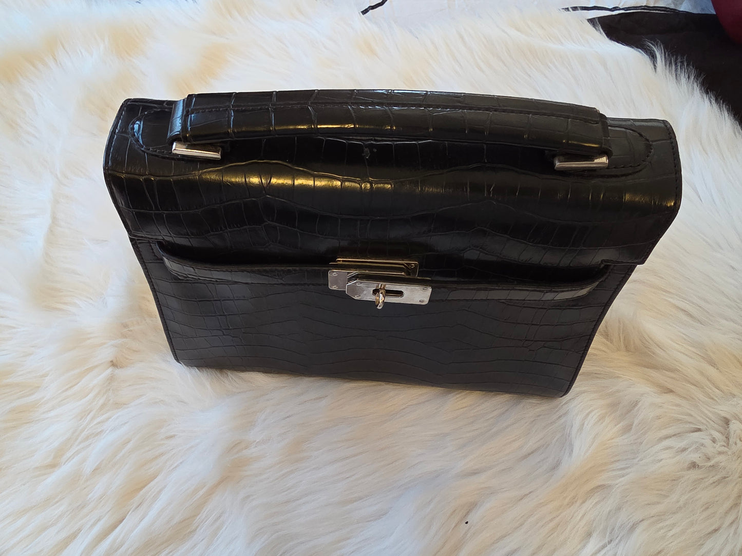 Elegant black croc-style handbag