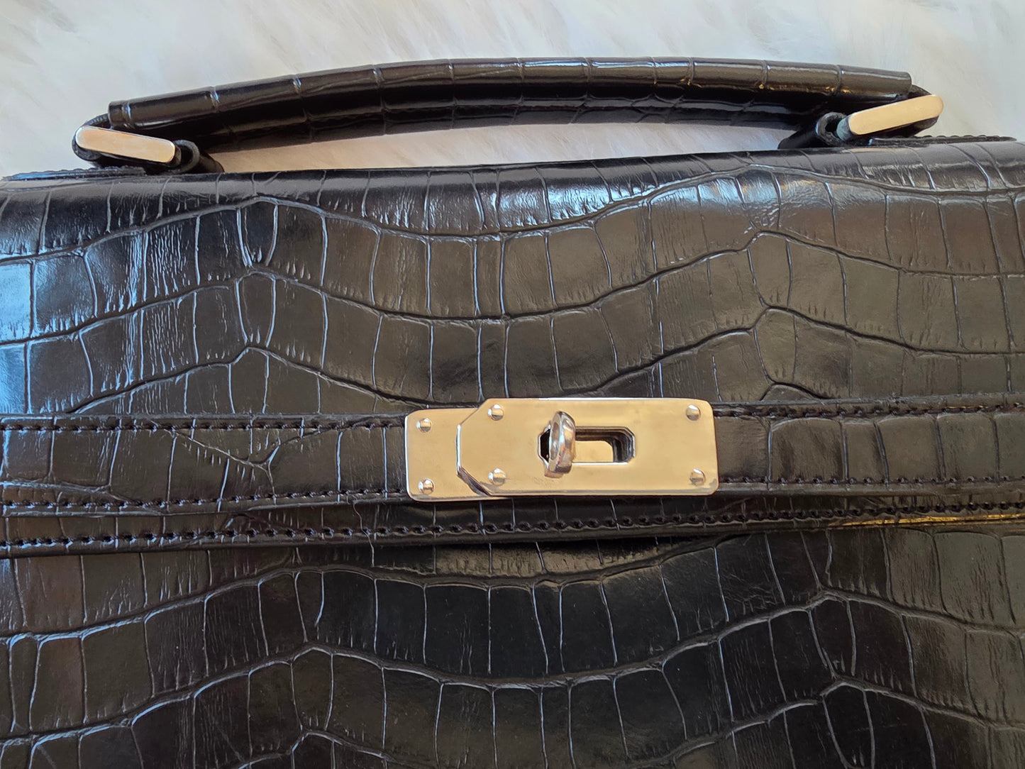 Elegant black croc-style handbag