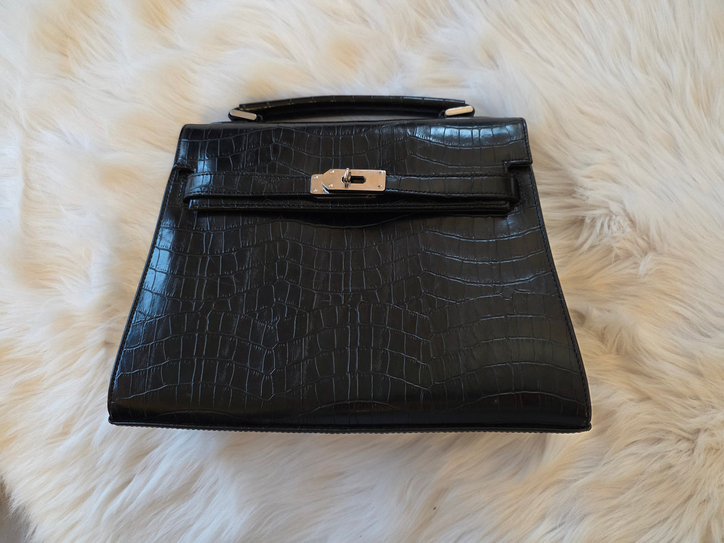 Elegant black croc-style handbag
